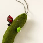 Pickleball-playing Pickle Ornament 1
